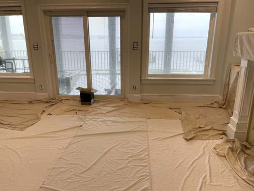 Use a drop cloth to catch falling debris